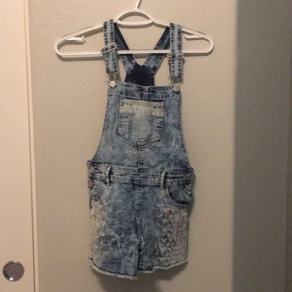 Kids jean jumper with colorful detailing.